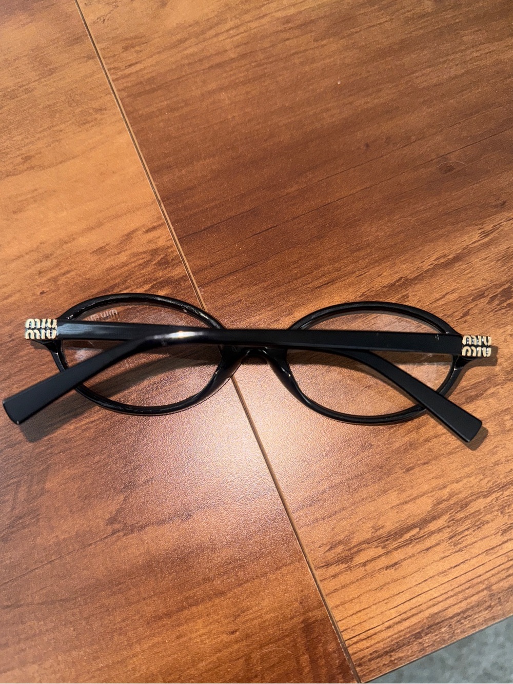 MIUMIU Oval Glasses